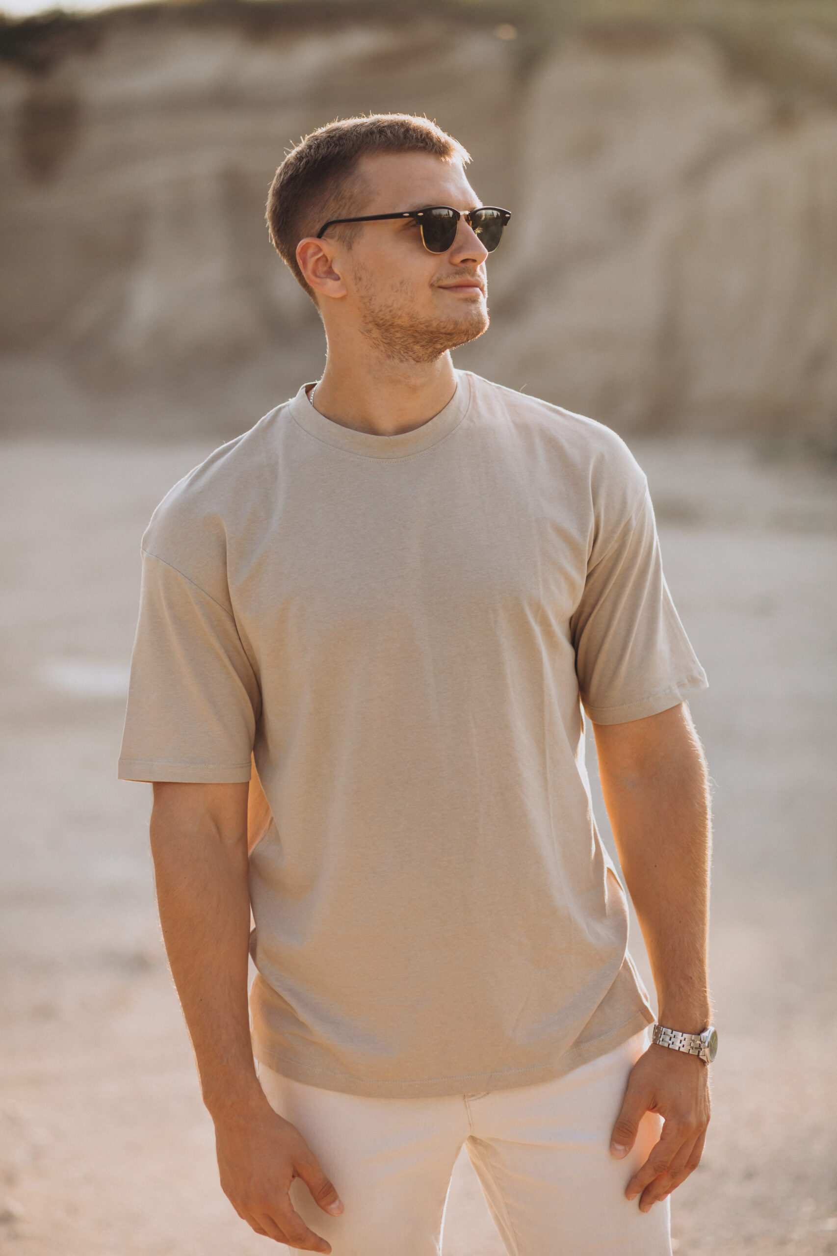 young handsome man posing in quarry young handsome man posing in quarry